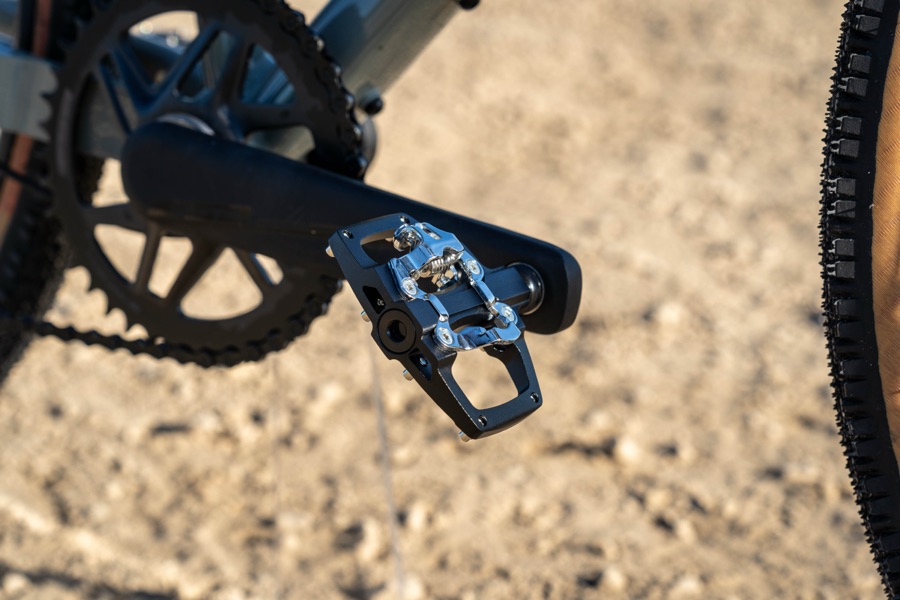 Origin8 Dual Sport pedal mounted on a gravel bike, close-up detail